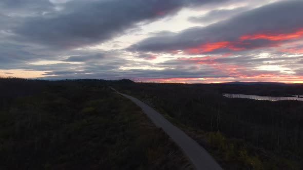 View of Peaceful Lakes and Scenic Road From Above alt
