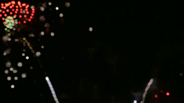 Colorful Firework display at night on sky background alt