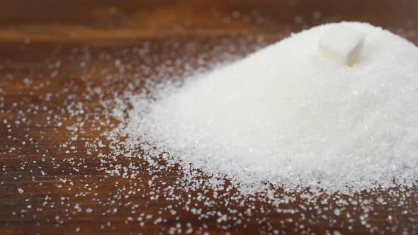 Lump Sugar Falls Down On Granulated Sugar