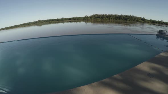 View of swimming pool near lake