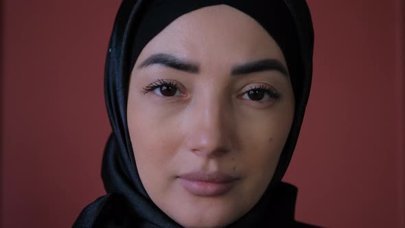 Close Up Young Muslim Woman in Hijab Looking at Camera