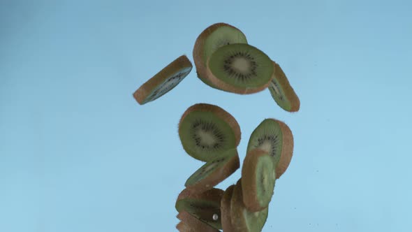 Sliced kiwi flying in slow motion, shot with Phantom Flex 4K at 1000 frames per second alt