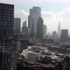 Fly-past skyscrapers near Liverpool Street Station revealing the London skyline on a hazy day - VideoHive Item for Sale