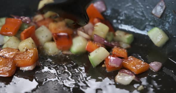 Mixing Frying Vegetables in Pan Chef Cooking in Kitchen of Restaurant or Cafe