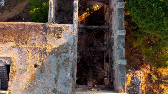 Slow motion overhead view of the monastery of carmona with a crane shot showing the landscape on the alt