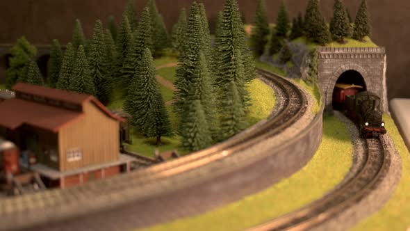 Model Train Coming Out From Tunnel. alt