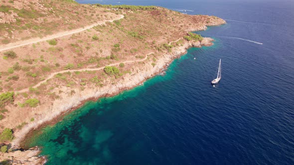 Drone Over Yacht Off Coastline Of Cap De Creus alt
