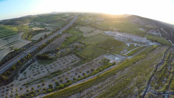 Large Fields of Grain and Cereal Crops Located Around Grain Processing Plant alt