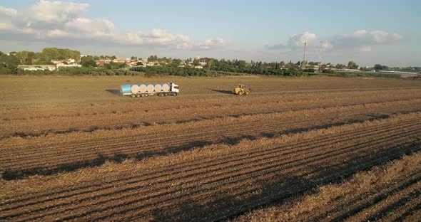 Aerial view of lorries in a cotton field, Israel. alt