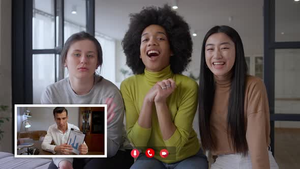 Positive Multiethnic Women Greeting Middle Eastern Man in Video Chat alt