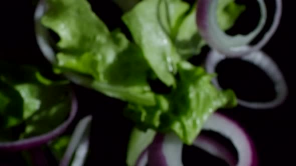 Red Onion Rings and Salad Leaves alt