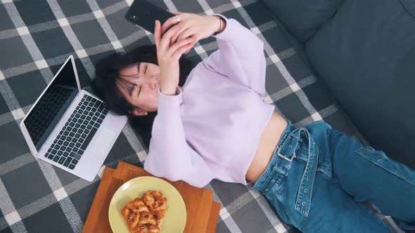 Young Influencer Posting Pictures of Her Breakfast on Social Media alt