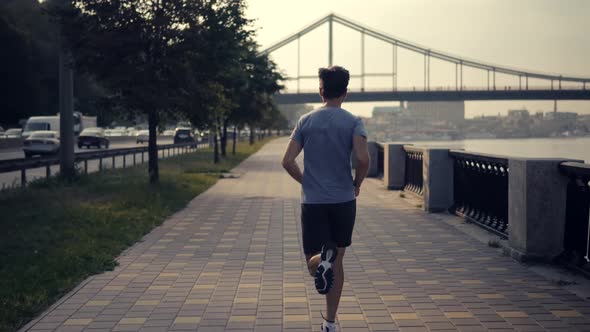 Sportsman Jog Cardio Workout. Man Runner Fitness Hard Training Before Running Marathon Competition. alt