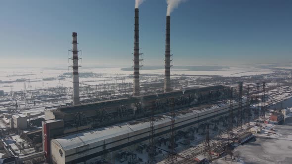 Aerial View of High Chimney Pipes with Grey Smoke From Coal Power Plant