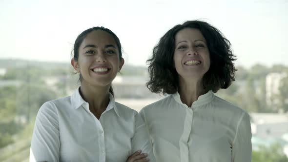 Cheerful Professional Businesswomen  alt