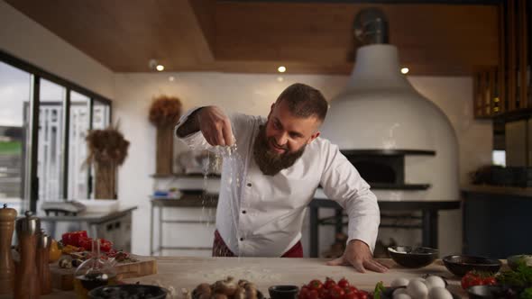 Experienced Chef Cook Flour Traditional Recipe in Restaurant alt