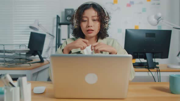Asian Businesswoman using desktop computer having a video call online conference