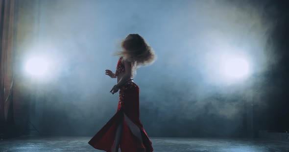 Young Girl the Blonde Dances Arab Dance Beautiful Movements with Legs and a Skirt alt