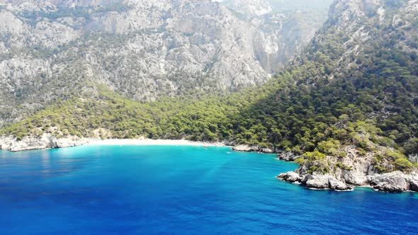 Splashing sea waves and beach. alt