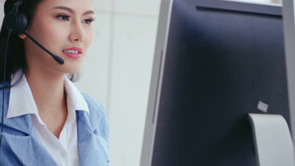 Customer Support Agent or Call Center with Headset Talking to Customer on Phone alt