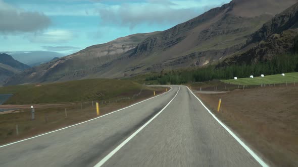 Car Driving on the Road To Iceland alt