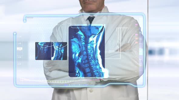 Doctor Diagnosing Virtual X-Ray Scans of Neck Bones and Skeletal Tissues