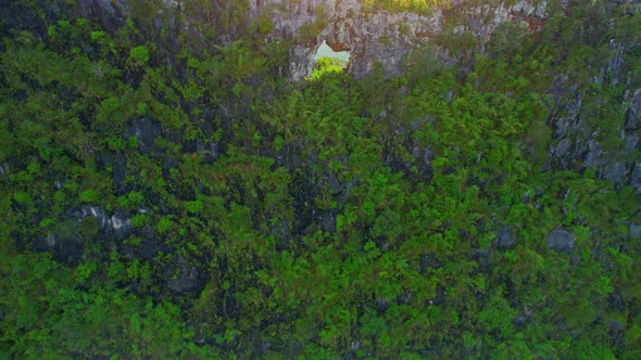 An aerial view from a drone flying over "Khao Thalu" alt