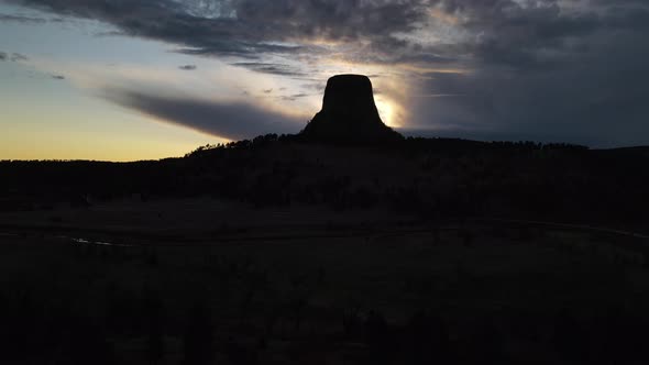 Devil's Tower National Monument in Wyoming. 4k drone video at sunset life up shot. alt
