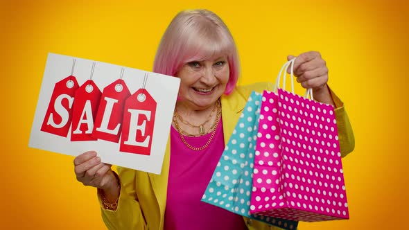 Elderly Granny Woman Showing Sale Inscription Banner Text Advertising Discounts Low Holidays Prices alt