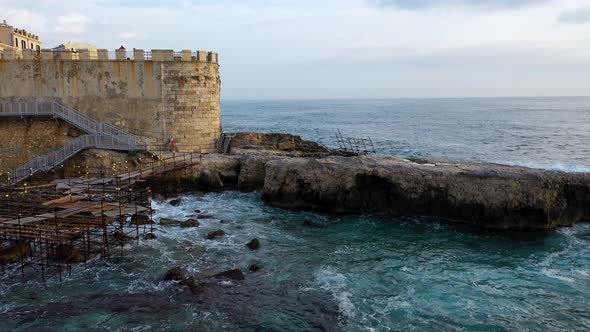 View of the Embankment of the Island of Ortigia During Sunrise alt