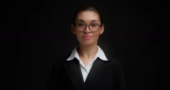Business Woman with Glasses with a Serious Face Shows Five Finger