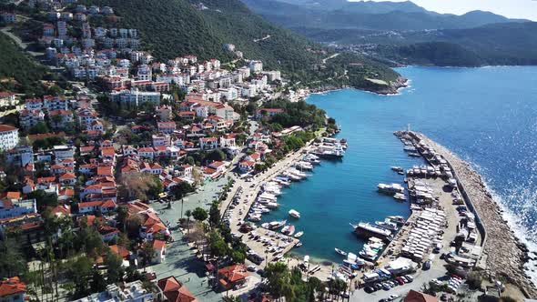 The top view from the drone of Kas resorts, bay, yahts, city in Mugla in Turkey alt