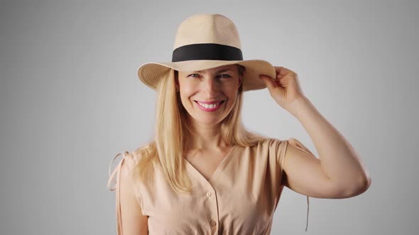 Smiling Woman in Hat Indoors