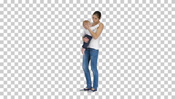 Young mother trying to calm down infant son, Alpha Channel alt