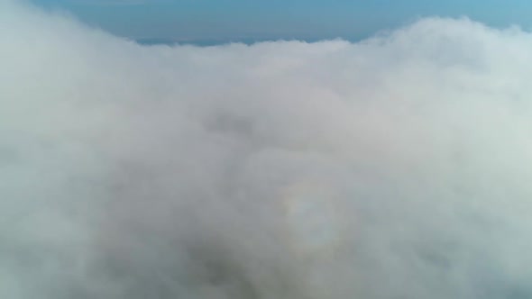 Flight Over the Fog High Above the Mountains of the Ukrainian Carpathians