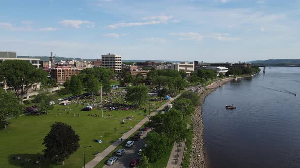 Flyover Riverside Park, La Crosse, Wisconsin, along Mississippi River during music festival.