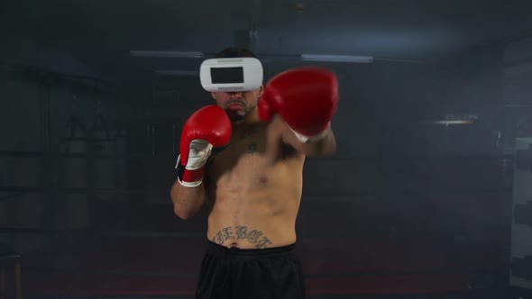 Young Man Boxing With Virtual Reality Headset 26