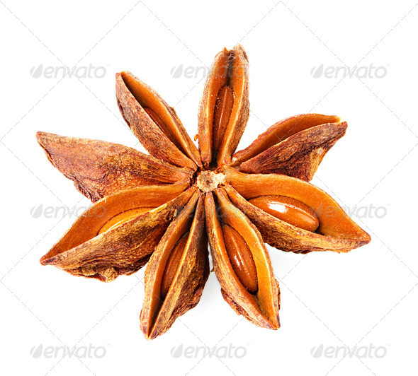 a single star anise isolated on white