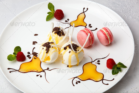 Ice cream with macaroons and berries - Stock Photo - Images
