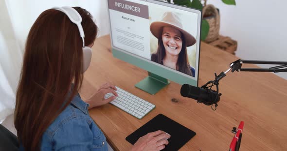 Influencer woman doing podcast using computer at home - Technology trend concept alt