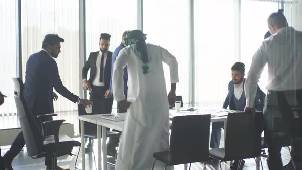 Row of Business People Sit in Conference Hall at Business Event alt