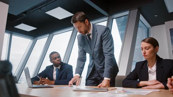 Business team brainstorming on a new project. Corporate manager communicating alt