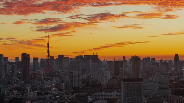 Time Lapse of the densely packs buildings of Tokyo Japan at sunrise alt