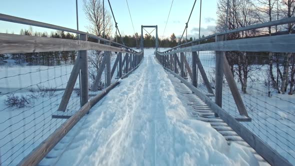 Frozen Wooden Bridge River. Norwey alt