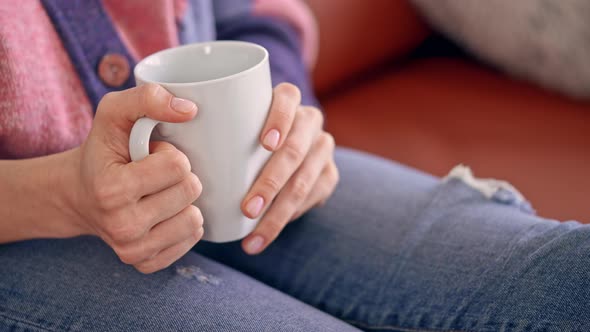 Close Up Female Drinking Coffee Indoors