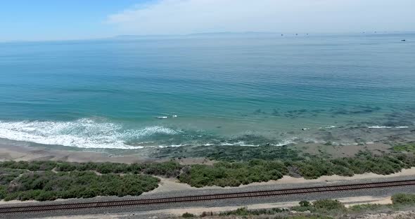 Flying off cliff toward ocean near Santa Barbara