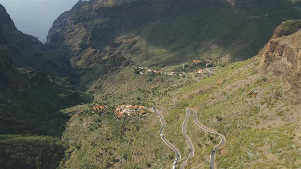 Aerial View of Mountain Road and Town in Masca Valley alt