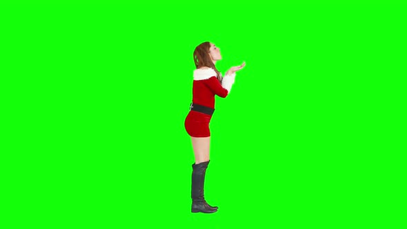 Christmas girl walking and blowing kiss alt