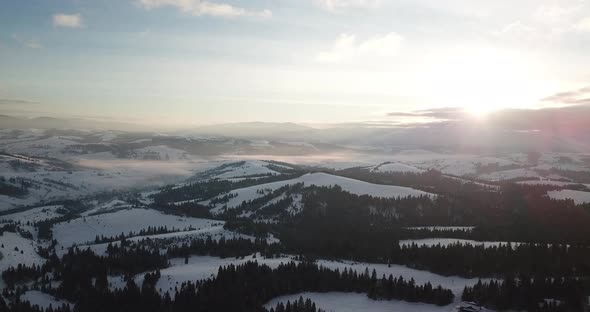 Aerial Shot of Majestic Sunrise in the Mountains alt