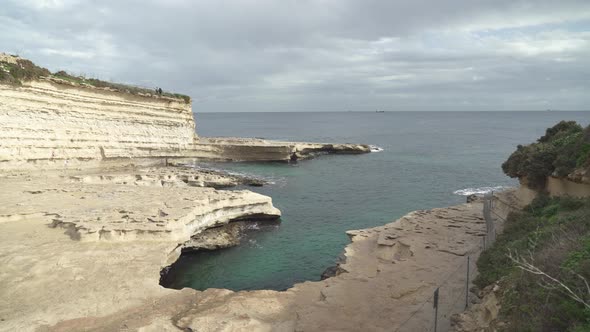 St. Peter's Pool in Marsaxlokk on Very Cloudy and Stormy Day in Winter in Malta